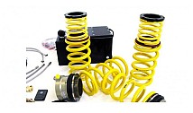 Hydraulic Adjustment In Combination With Suspension Spring