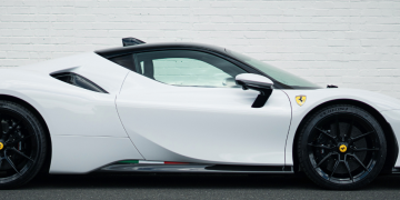 How Much Does a Ferrari Cost? Prices by Model, Year & Condition Logo